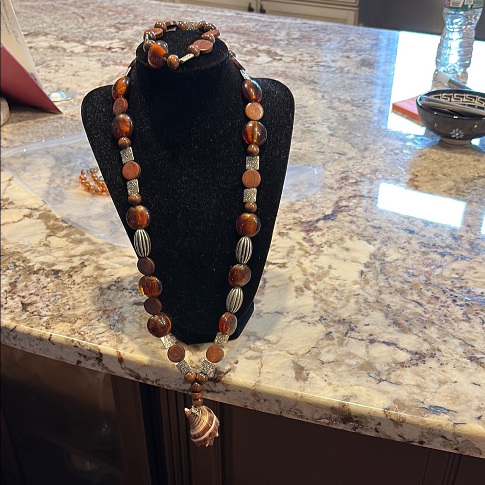 Elegant Beaded Necklace with Brown and Silver Accents